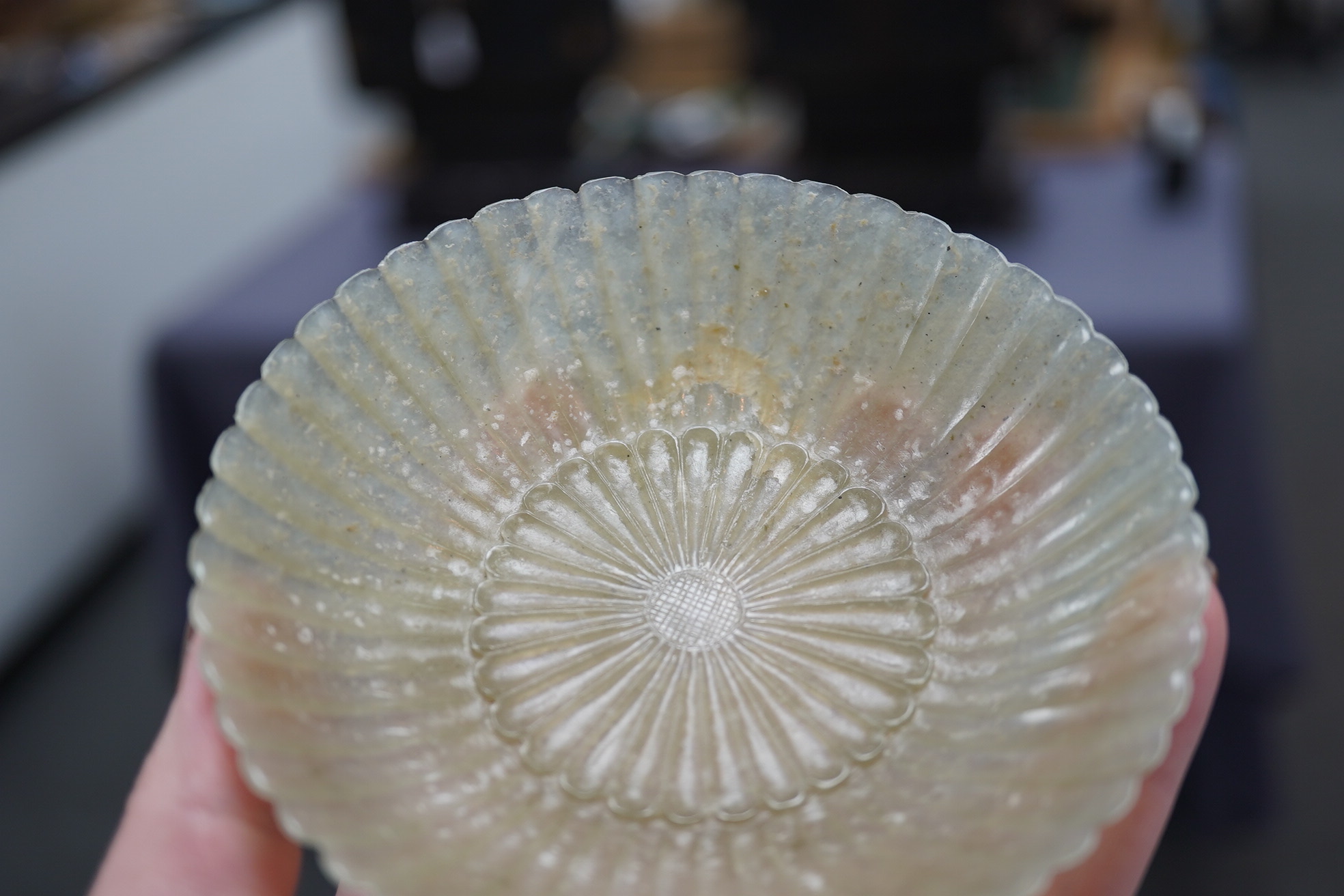 A Chinese pale celadon jade ‘chrysanthemum’ dish, Mughal style, 18th century